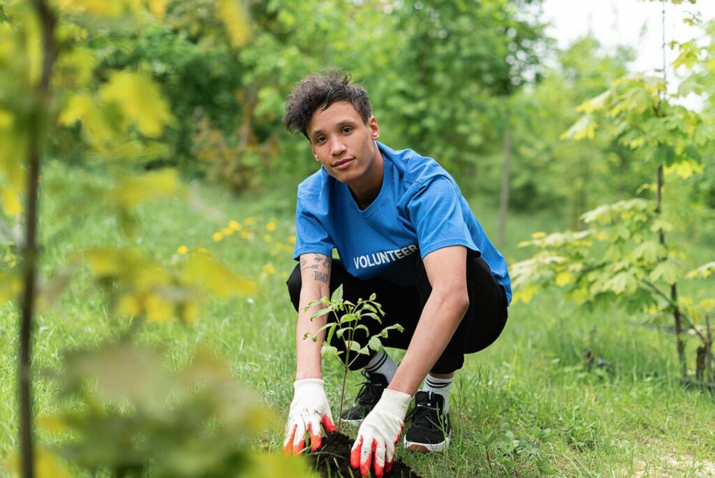 Man Planting a Tree, landscaping services in dubai